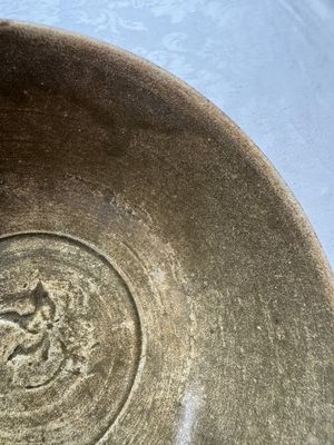 A group of 15 Chinese and Southeast Asian celadon and brown-glazed wares, 15th C. and later — photo 159