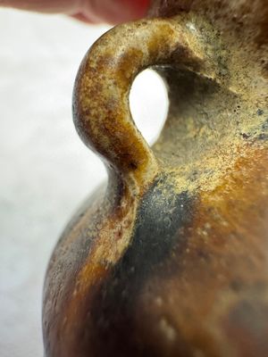 A group of 15 Chinese and Southeast Asian celadon and brown-glazed wares, 15th C. and later — photo 54