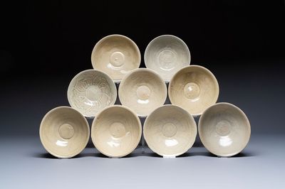 A group of nine Chinese celadon-glazed bowls with incised floral design from the Jepara shipwreck, Fujian kilns, Song