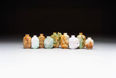 A group of nine Chinese jadeite snuff bottles, 20th C.