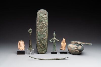 A group of seven bronze and pottery objects, Syria, Persia, and Luristan, 3rd C. and earlier