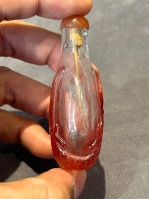 A group of seven Chinese red-overlay glass and red glass snuff bottles, 19/20th C. — photo 17