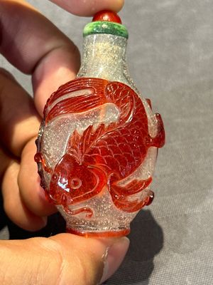 A group of seven Chinese red-overlay glass and red glass snuff bottles, 19/20th C. — photo 27
