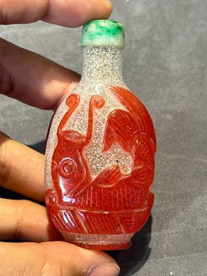 A group of seven Chinese red-overlay glass and red glass snuff bottles, 19/20th C. — photo 30