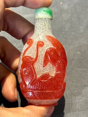 A group of seven Chinese red-overlay glass and red glass snuff bottles, 19/20th C. — photo 32