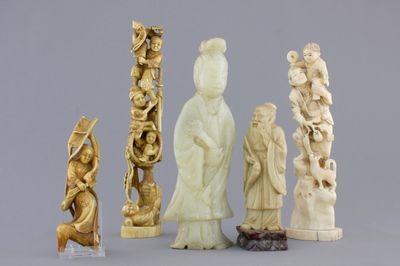 A group of various Chinese and Japanese carvings in soapstone, ivory and jadeite, 19th C.