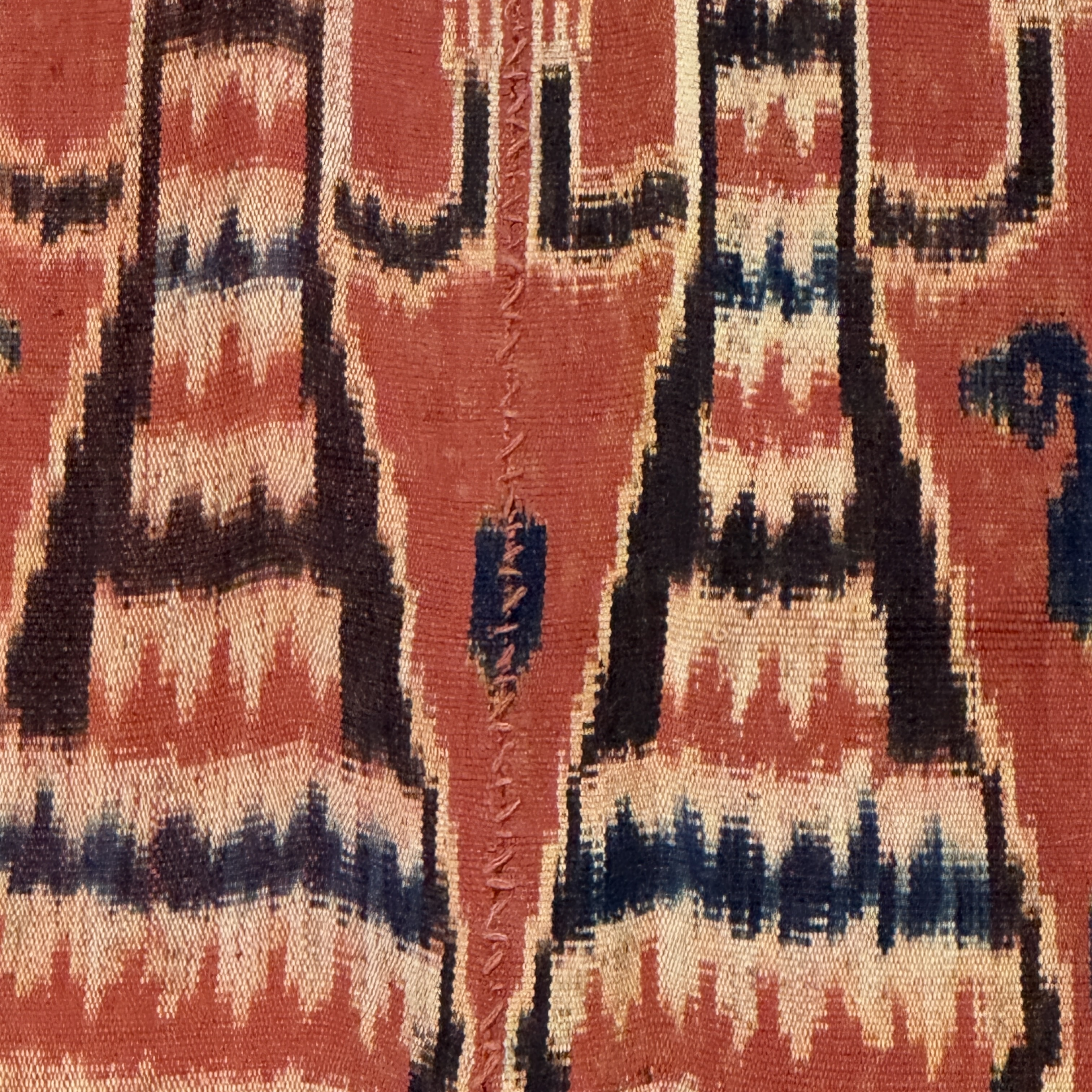 A hinggi shoulder cloth with warrior motifs and an Iban pua textile with human and animal motifs — photo 12