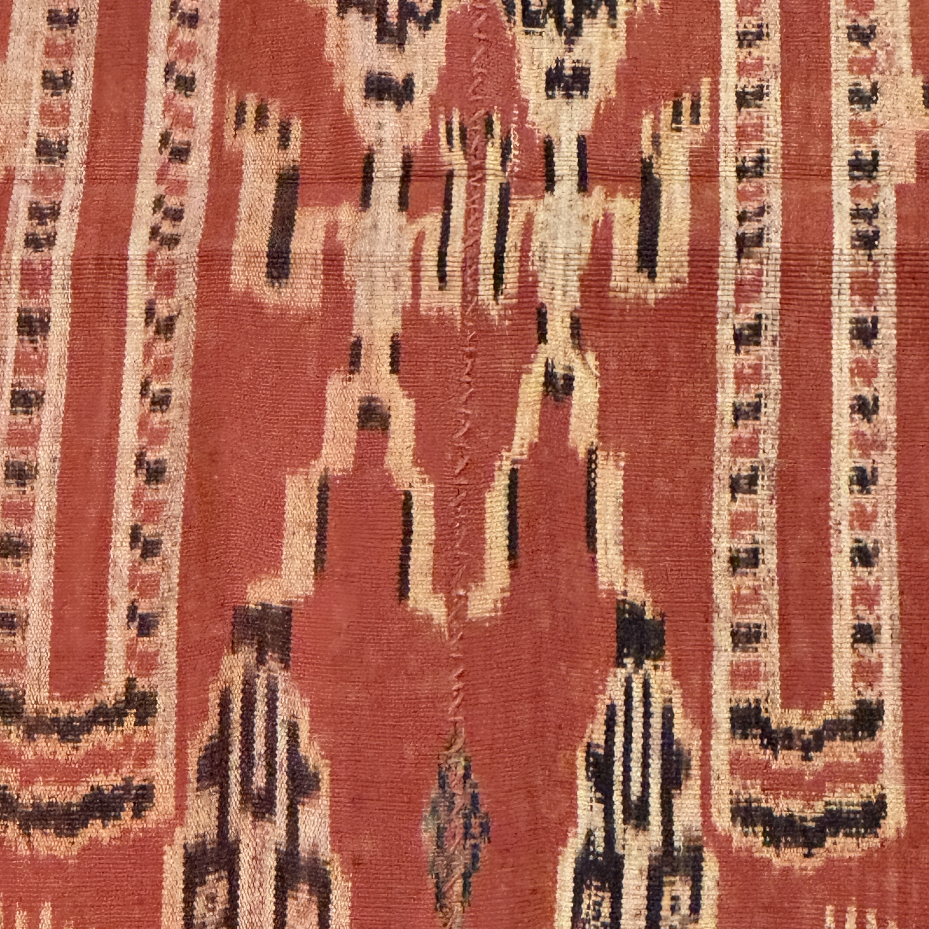 A hinggi shoulder cloth with warrior motifs and an Iban pua textile with human and animal motifs — photo 13
