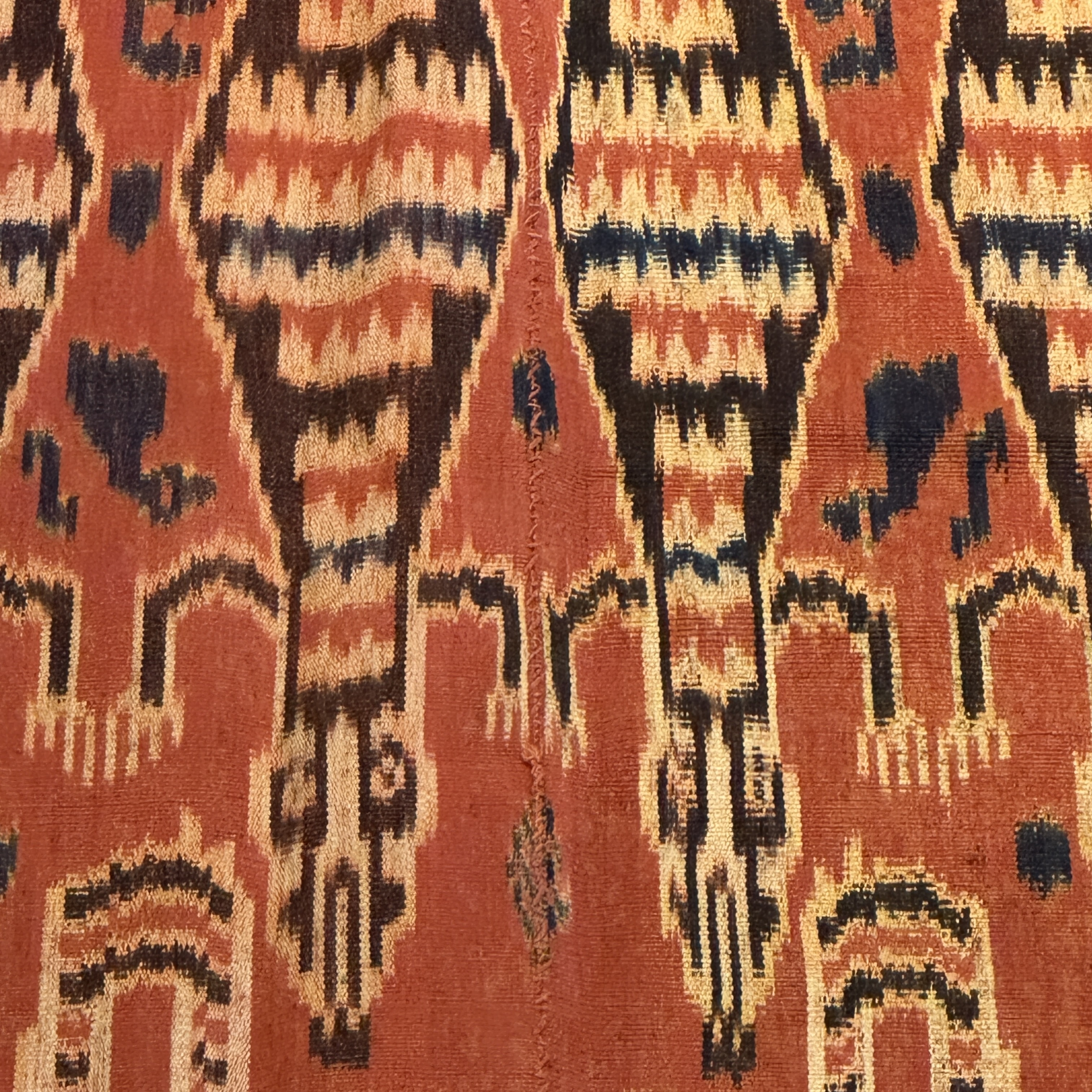 A hinggi shoulder cloth with warrior motifs and an Iban pua textile with human and animal motifs — photo 14