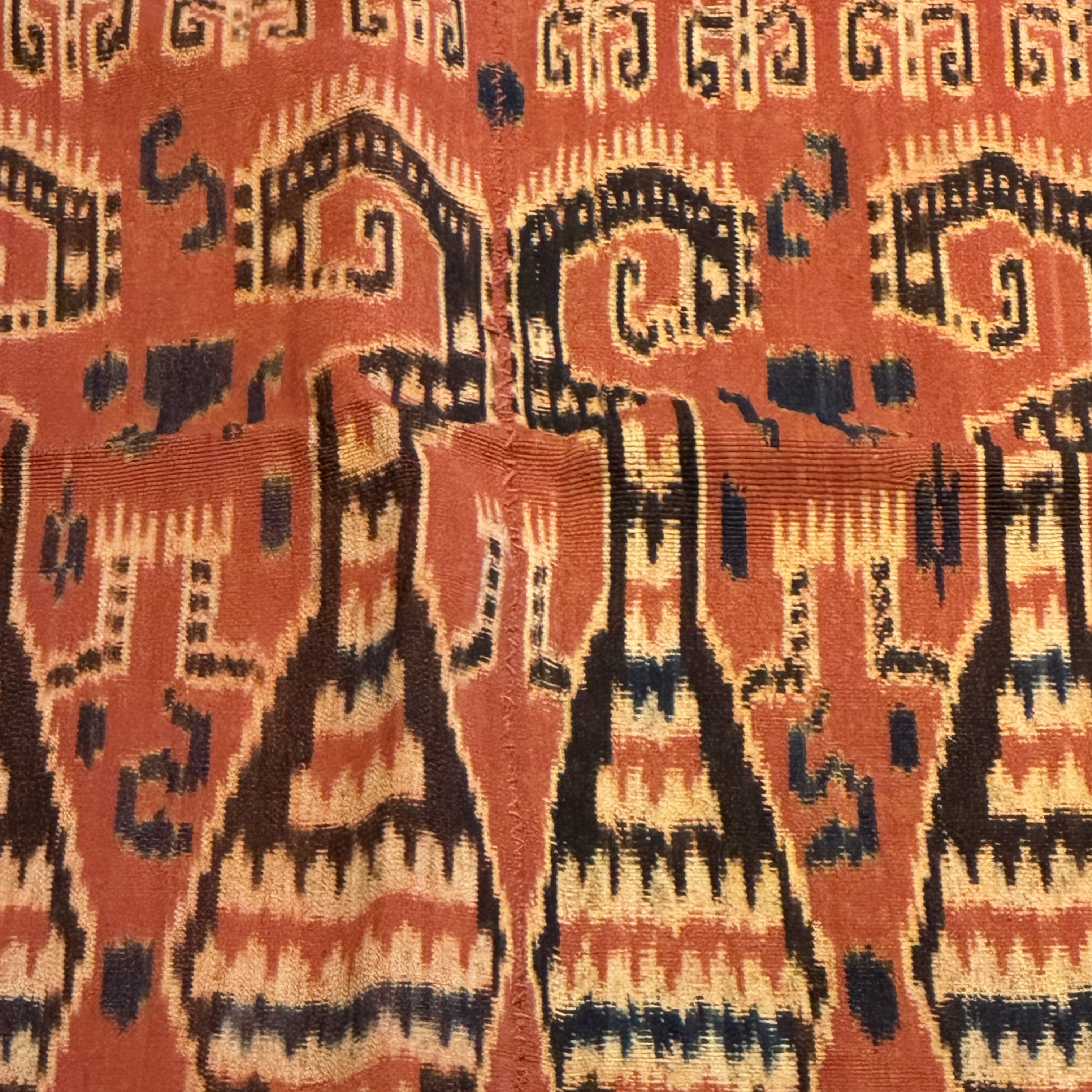 A hinggi shoulder cloth with warrior motifs and an Iban pua textile with human and animal motifs — photo 15
