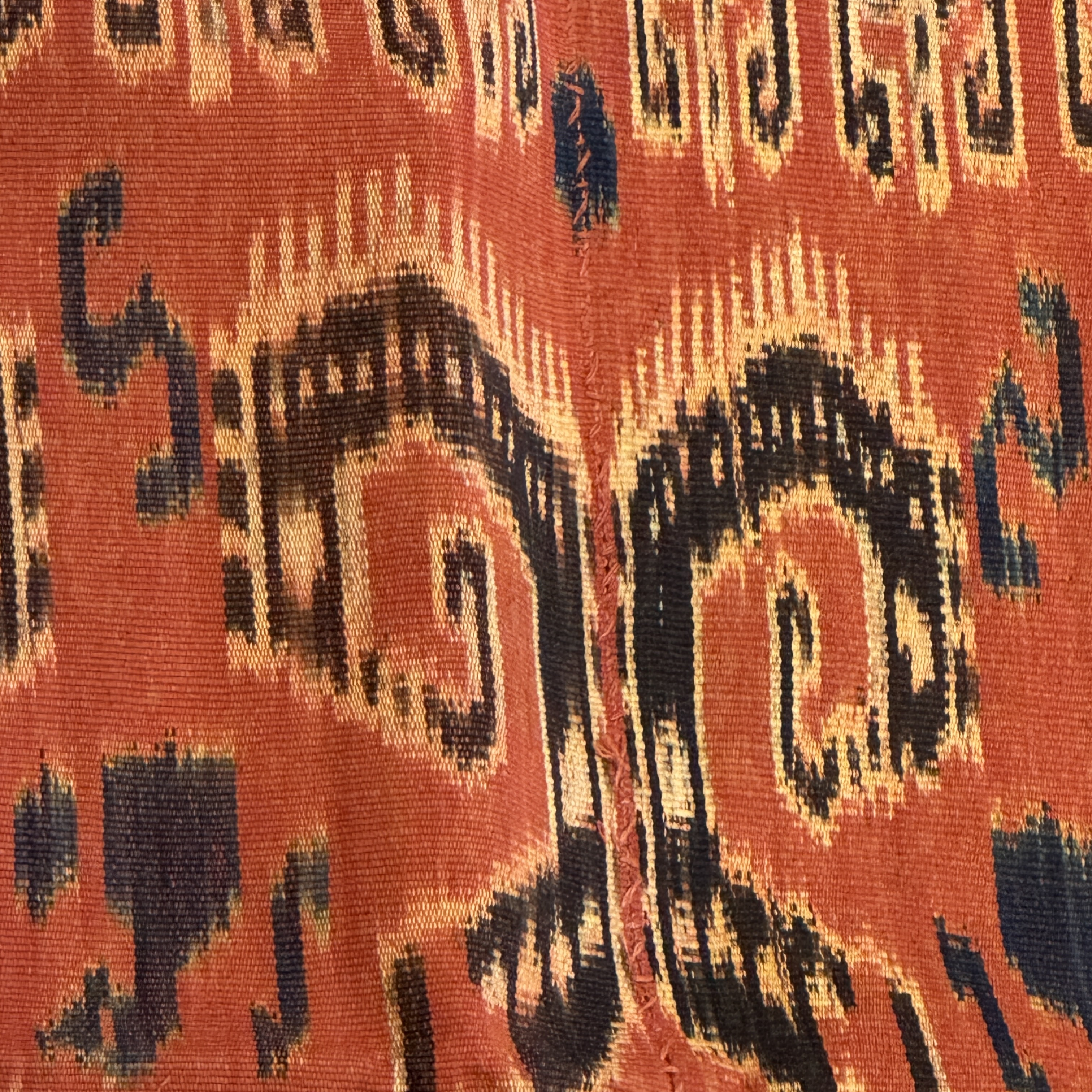 A hinggi shoulder cloth with warrior motifs and an Iban pua textile with human and animal motifs — photo 17