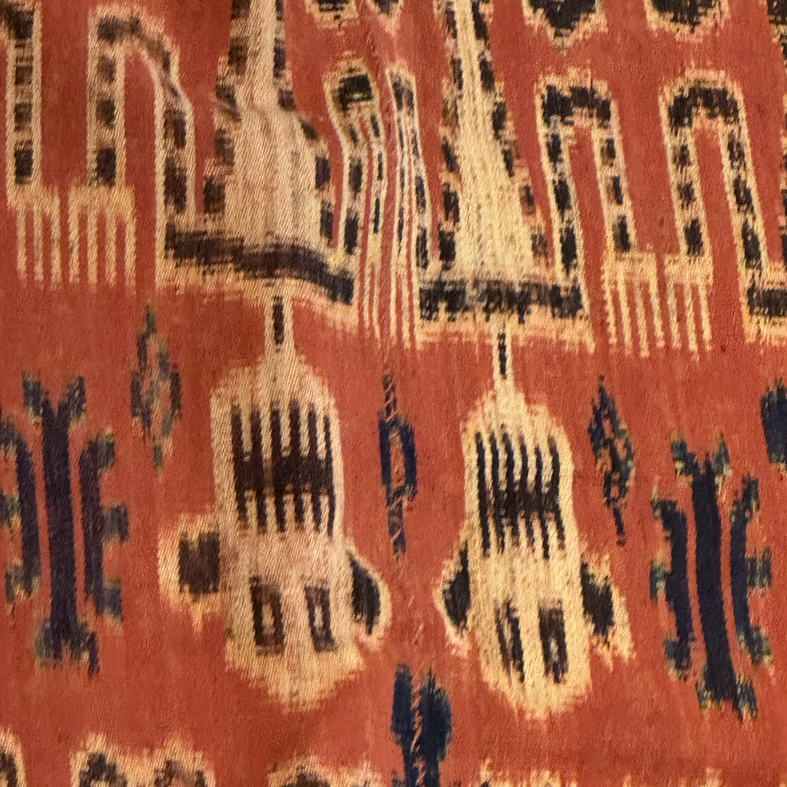 A hinggi shoulder cloth with warrior motifs and an Iban pua textile with human and animal motifs — photo 19