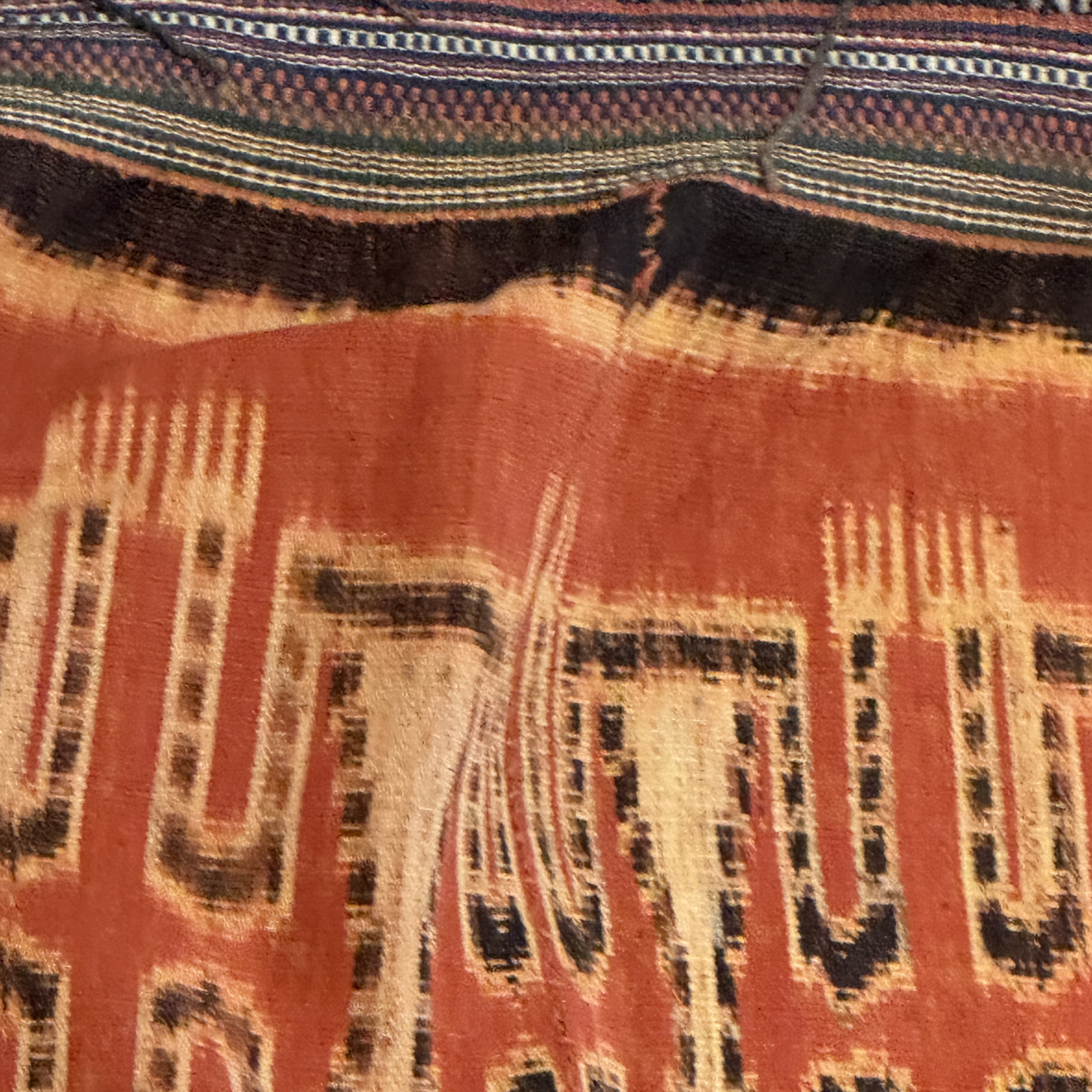 A hinggi shoulder cloth with warrior motifs and an Iban pua textile with human and animal motifs — photo 20