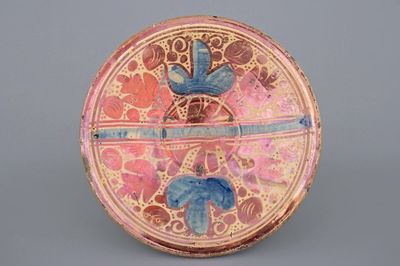 A Hispano Moresque plate with blue and luster glaze, 16th C.