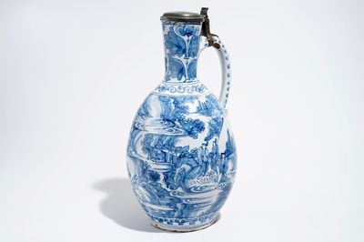 A huge blue and white Dutch Delft chinoiserie jug with an Antwerp pewter lid, 17th C.