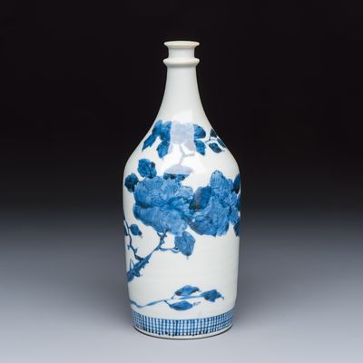 A Japanese Arita blue and white 'Peony' sake bottle, Edo/Meiji, 19th C.