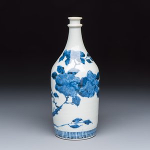 A Japanese Arita blue and white 'Peony' sake bottle — photo 1