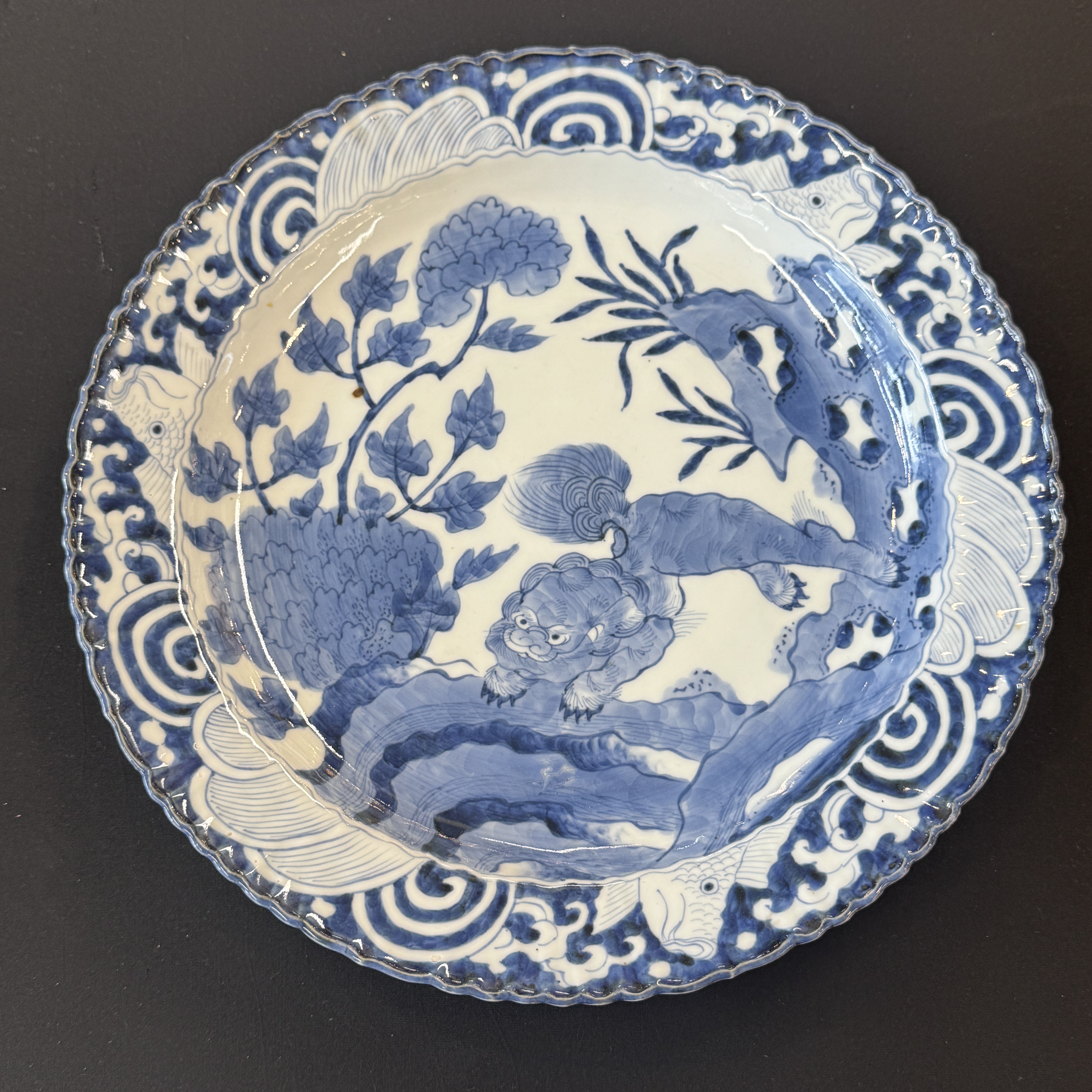 A Japanese Arita blue and white 'Shishi' dish — photo 1