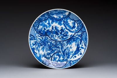 A Japanese blue and white dish with narrative design, Meiji, 19th C.