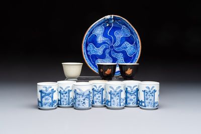 A Japanese blue and white plate, eight cups, and two gilt-lacquered porcelain cups, 19/20th C.