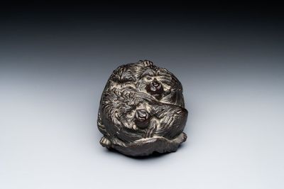 A Japanese bronze okimono with three monkeys, Yoshinobu seal mark, Meiji period