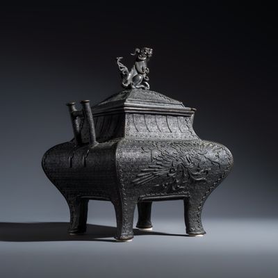 A Japanese bronze 'Phoenix' square incense burner and cover with shishi finial, Eisei 榮清 mark, Meiji, 19th C.