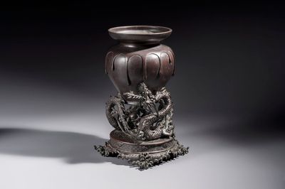 A Japanese bronze vase carried by a dragon, Meiji, 19th C.