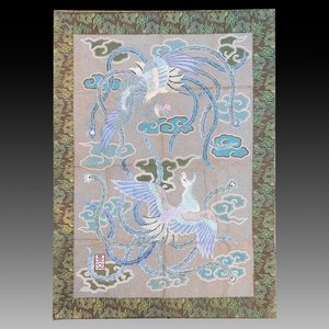 A Japanese embroidered wool and silk wall tapestry with two phoenixes, Meiji, 19th C. — photo 1