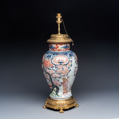 A Japanese Imari 'Figures and Flowering Branches' vase with applied design, mounted as a lamp, Edo, 18th C.