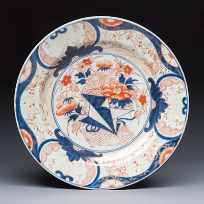 A Japanese Imari 'Origami and Flowers' dish, Edo, early 18th C.