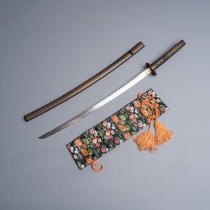 A Japanese katana, signed Hizen no Kuni Dewa no Kami Fujiwara Yukihiro, with koshirae, Edo, dated Genroku 15 (1702) — photo 1