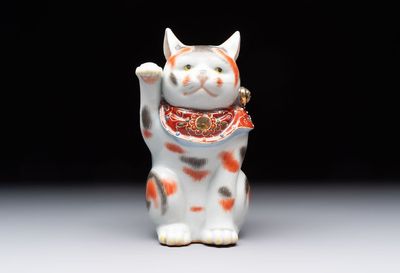A Japanese Kutani figure of a Maneki-neko Beckoning Cat, 20th C.