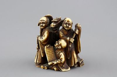 A Japanese patinated ivory netsuke: a dragon amongst sages, 19th C.