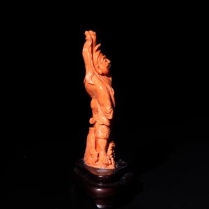 A Japanese red coral sculpture of a fisherman on wooden stand, 19/20th C. — photo 2