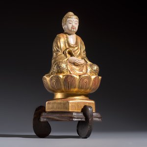 A Japanese Satsuma figure of Buddha seated on a lotus base, Hododa 保土田 mark, Meiji, 19/20th C. — 照片 1