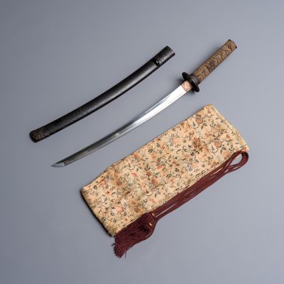 A Japanese wakizashi, signed Izumi no Kami Kanesada, with koshirae, Edo, 18/19th C., Edo, 18/19th C.