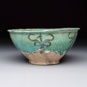 A Kashan black and turquoise pottery bowl with a calligraphic border — photo 6