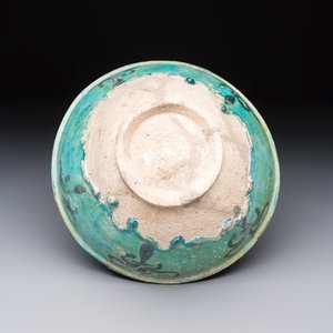 A Kashan black and turquoise pottery bowl with a calligraphic border — photo 8