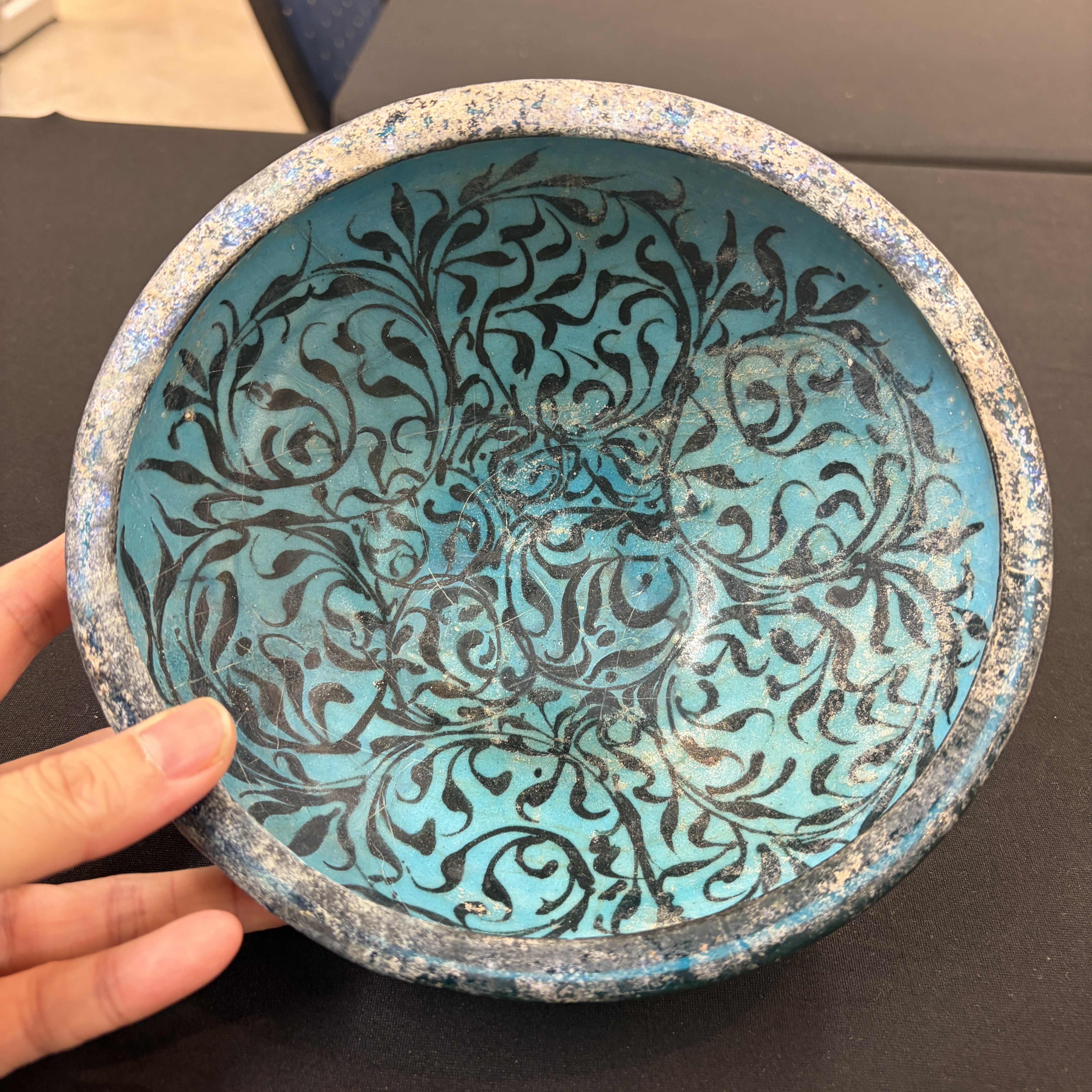 A Kashan black and turquoise pottery bowl with water-weed design — photo 2