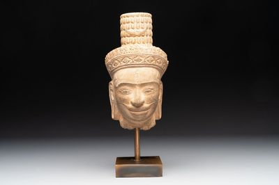 A Khmer Angkor Wat-style sandstone head of Shiva, probably 12th C.