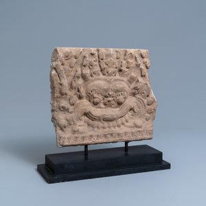 A Khmer-stye stone carving fragment with the head of Mahakala, Cambodia, 15th C. or later — photo 1