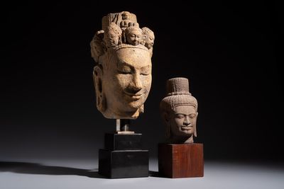 A Khmer-style carved stone head and a carved stone head of a deity, Cambodia and Thailand, 20th C. or earlier