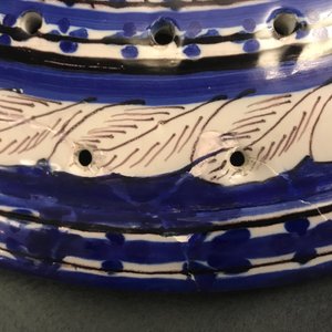 A large blue and manganese Frisian Delft fish strainer, Tichelaar, Makkum, 19th C. — photo 6