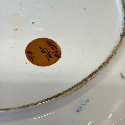 A large blue and white Dutch Delft chinoiserie dish with landscape and figural design — photo 13