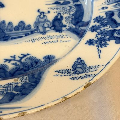 A large blue and white Dutch Delft chinoiserie dish with landscape and figural design — photo 5