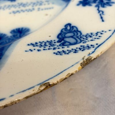 A large blue and white Dutch Delft chinoiserie dish with landscape and figural design — photo 7