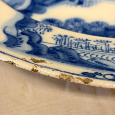 A large blue and white Dutch Delft chinoiserie dish with landscape and figural design — photo 8