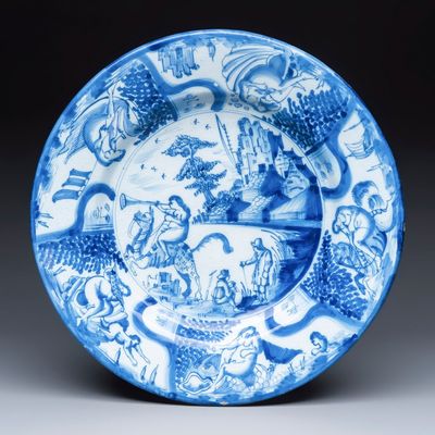A large blue and white Dutch Delft mythological dish with a trumpet rider, 17th C.