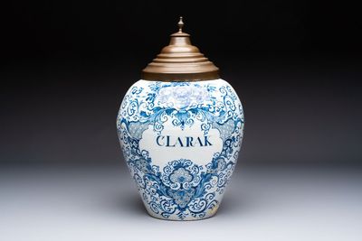 A large blue and white Dutch Delft tobacco jar, inscribed 'Clarak', 18th C.