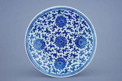 A large blue and white lotus scroll dish, Qianlong mark and of the period